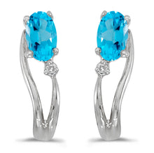  14k White Gold Oval Blue Topaz And Diamond Wave Earrings